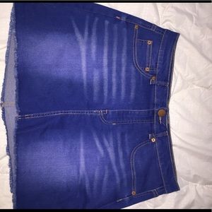 Mid rise Jean skirt.